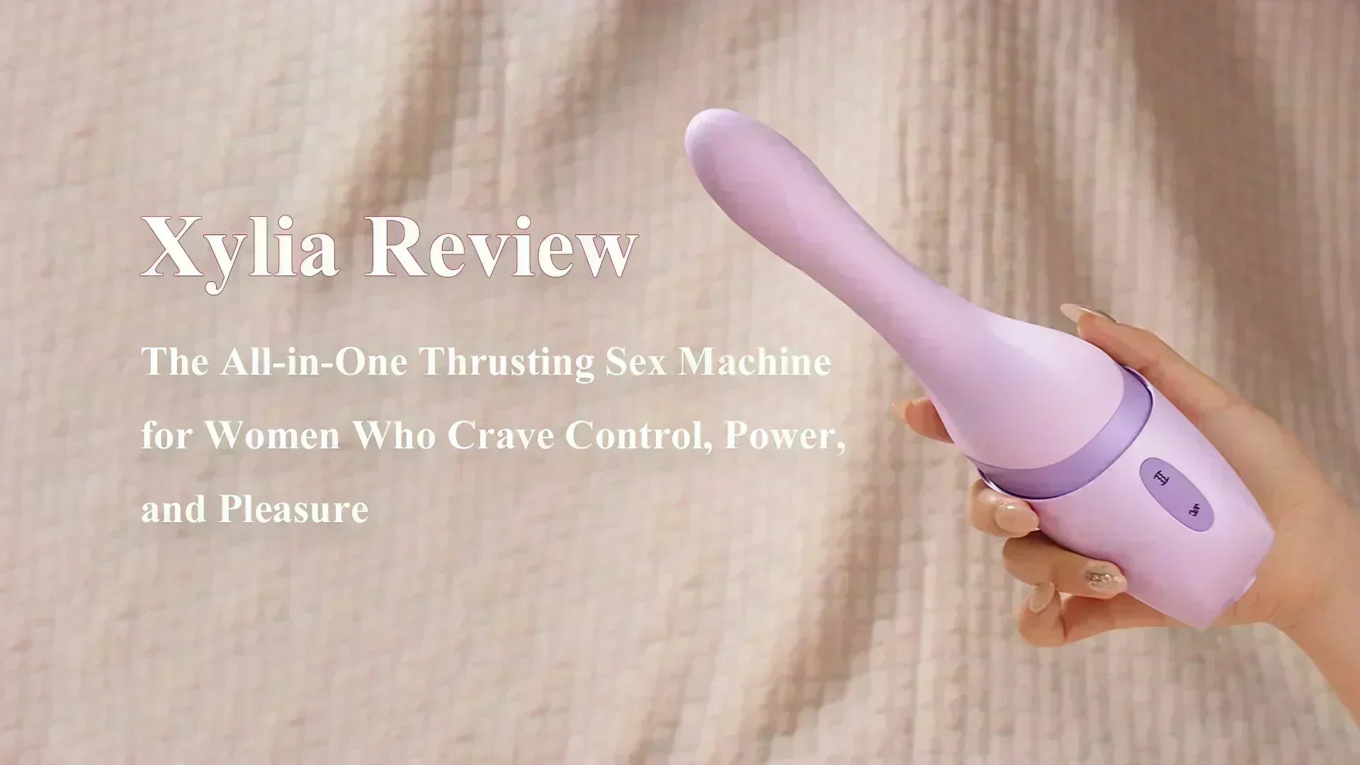 A product promotional image showing a hand holding a purple adult personal massager against a soft, neutral fabric background, with the text “Xylia Review” on the left.